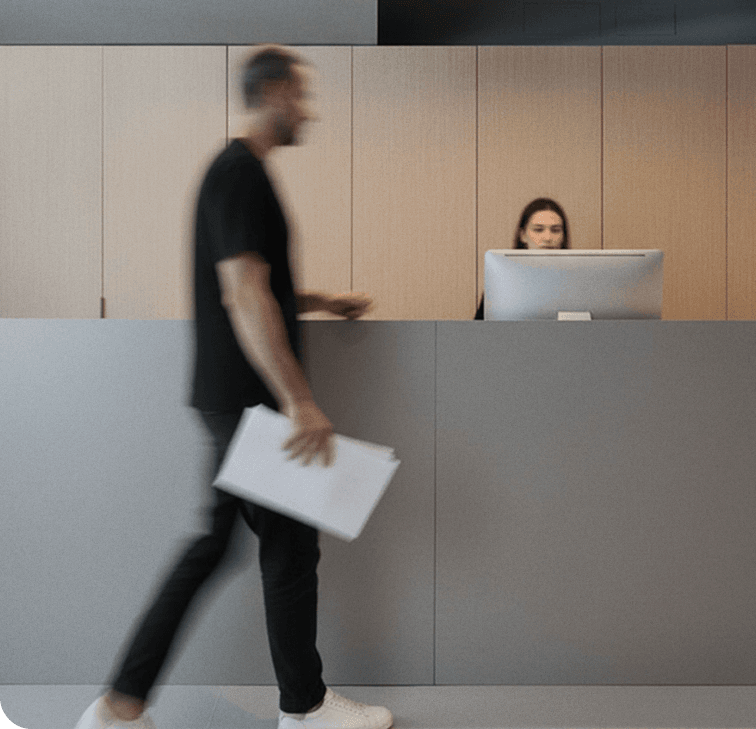 Healthcare professional using a tablet in a modern clinic